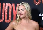 Exploring the Multi-Talented Elisha Cuthbert