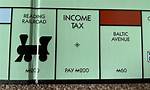 How Does Income Tax Work in Monopoly?