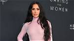 Kim Kardashian Shows off Abs and Sideboob in Bikini ·