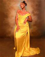 Stunning Yellow Dresses Inspired by Tems' Iconic Style