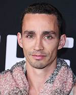 Unveiling the Charismatic Journey of Robert Sheehan