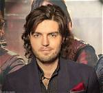 Unveiling the Charismatic Journey of Tom Burke
